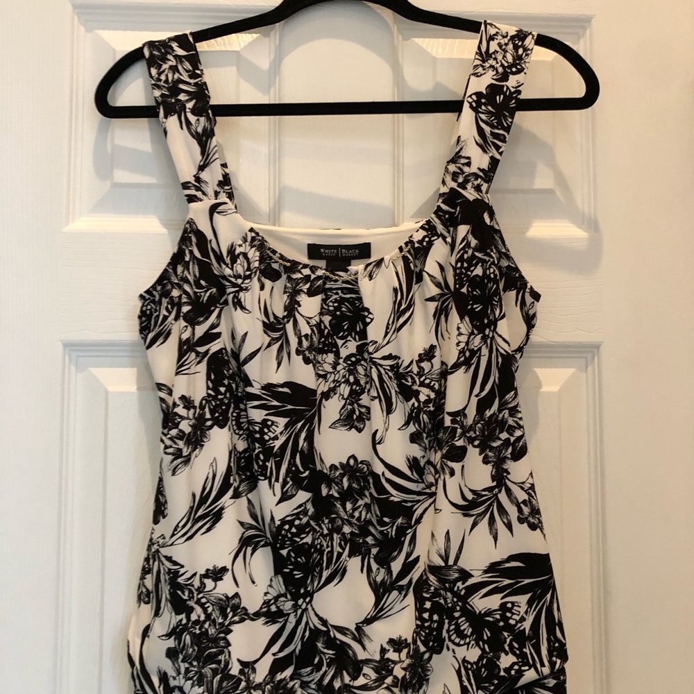 White House Black Market Black and white polyester and spandex floral top.